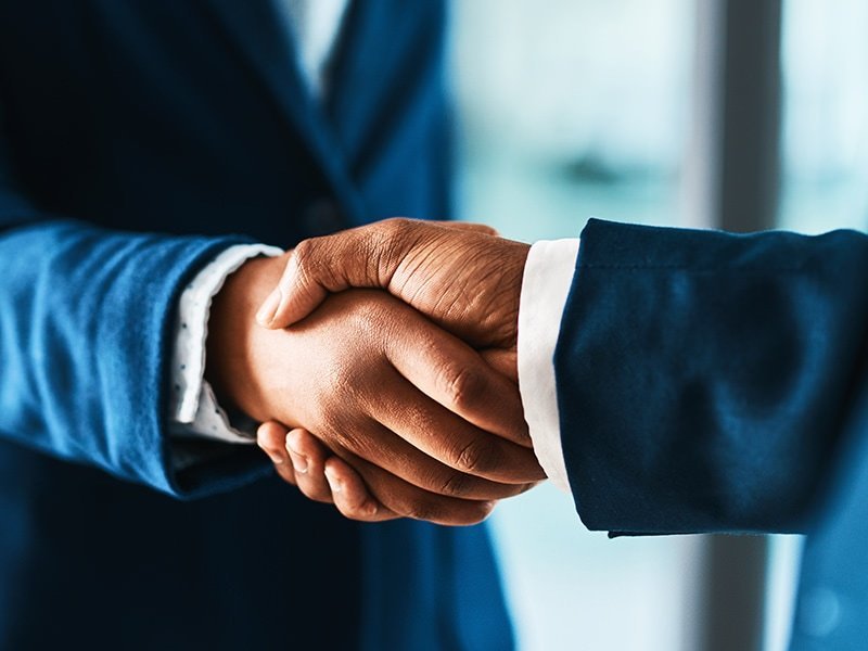 Beispielbild Händedruck bei dem Geschäftsabschluss